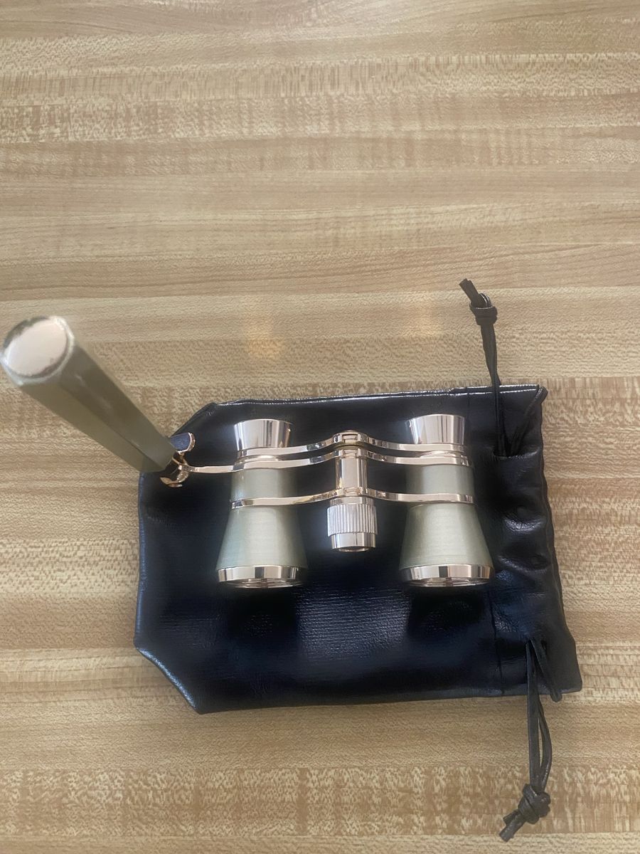 New opera glasses 4x with case.