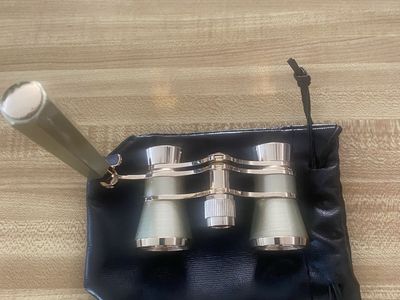 New opera glasses 4x with case.