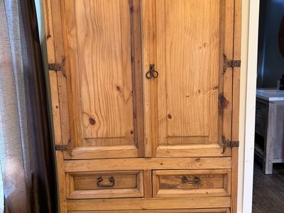 Rustic wood armoire