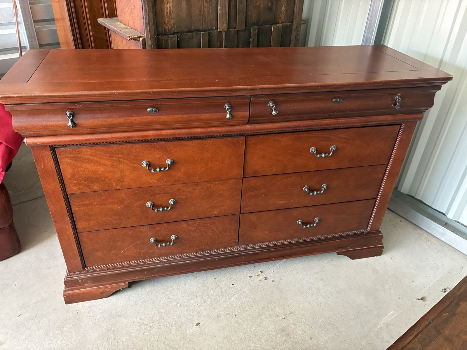 Cherry Wood Dresser with 8 Drawers and Decorative Trim