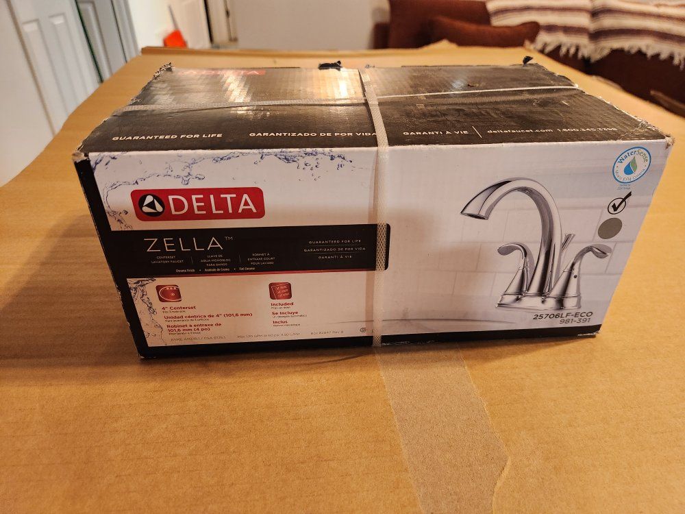 Delta Zella 4" center set bathroom faucet NIB