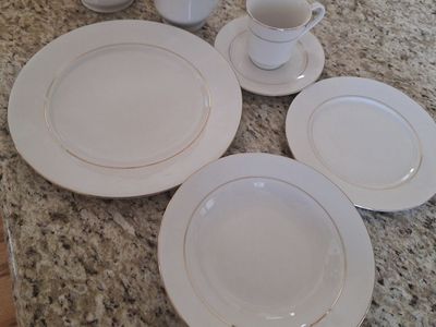 Farberware China Simplicity Gold with Gold Trim. Service for 8.
