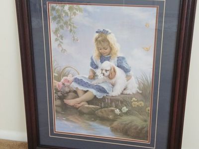 Framed Art Print of Young Girl with Puppy by Stream