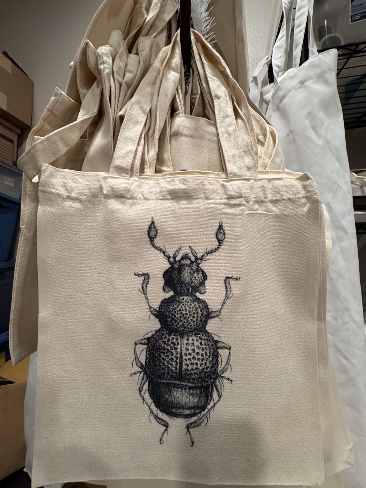 BLACK BUG CANVAS TOTE BAG WITH A SEWN IN POUCH