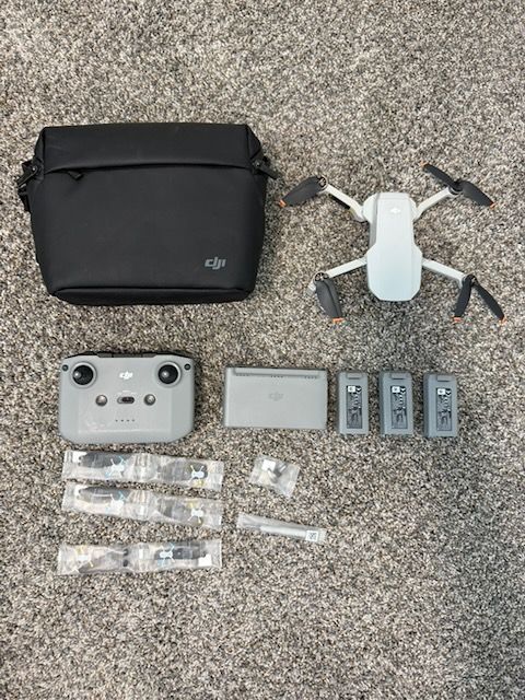 DJI Mini 2 plus controller, 3 batteries, new blades, and more extras!