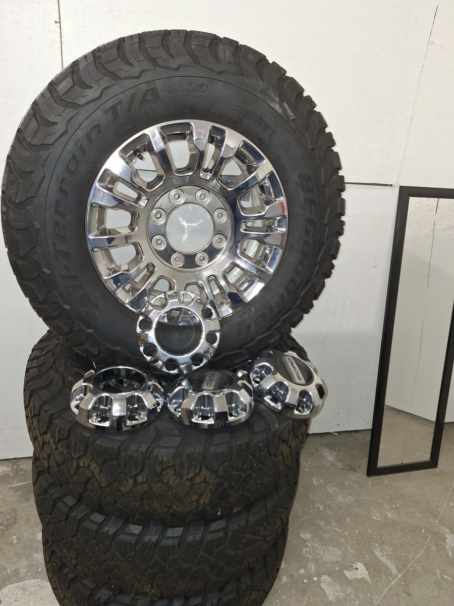 8x170, 18x8 Ford OEM wheels and BFG tires 