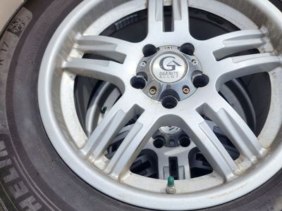 4 Michelin X-Ice Snow Tires on Rims