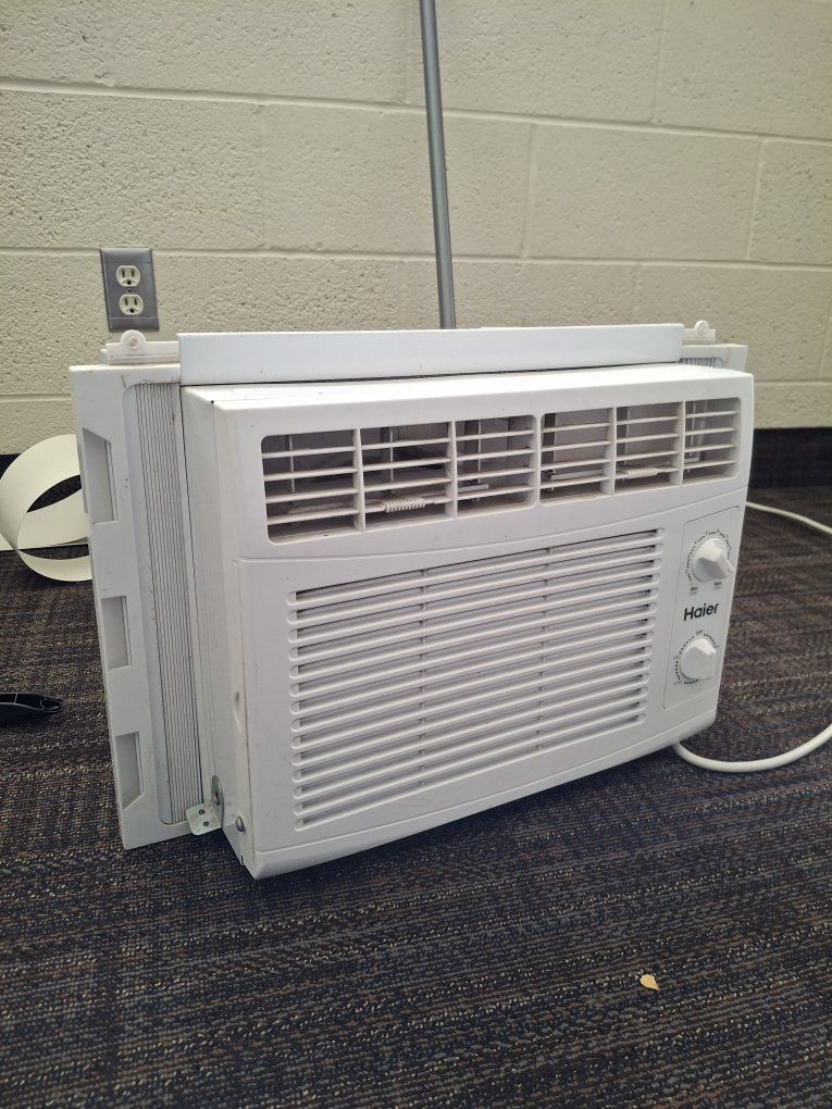 Haier Window Air Conditioner, Compact White AC Unit, Adjustable Controls