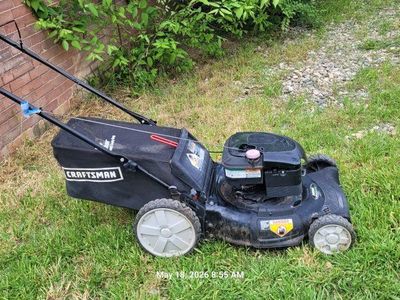 pushing lawn mower good working conditions.