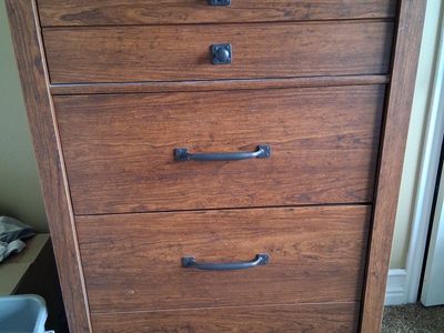 Wooden 4-Drawer Dresser/Chest of Drawers with Metal Accents - Brown Finish, Good Condition