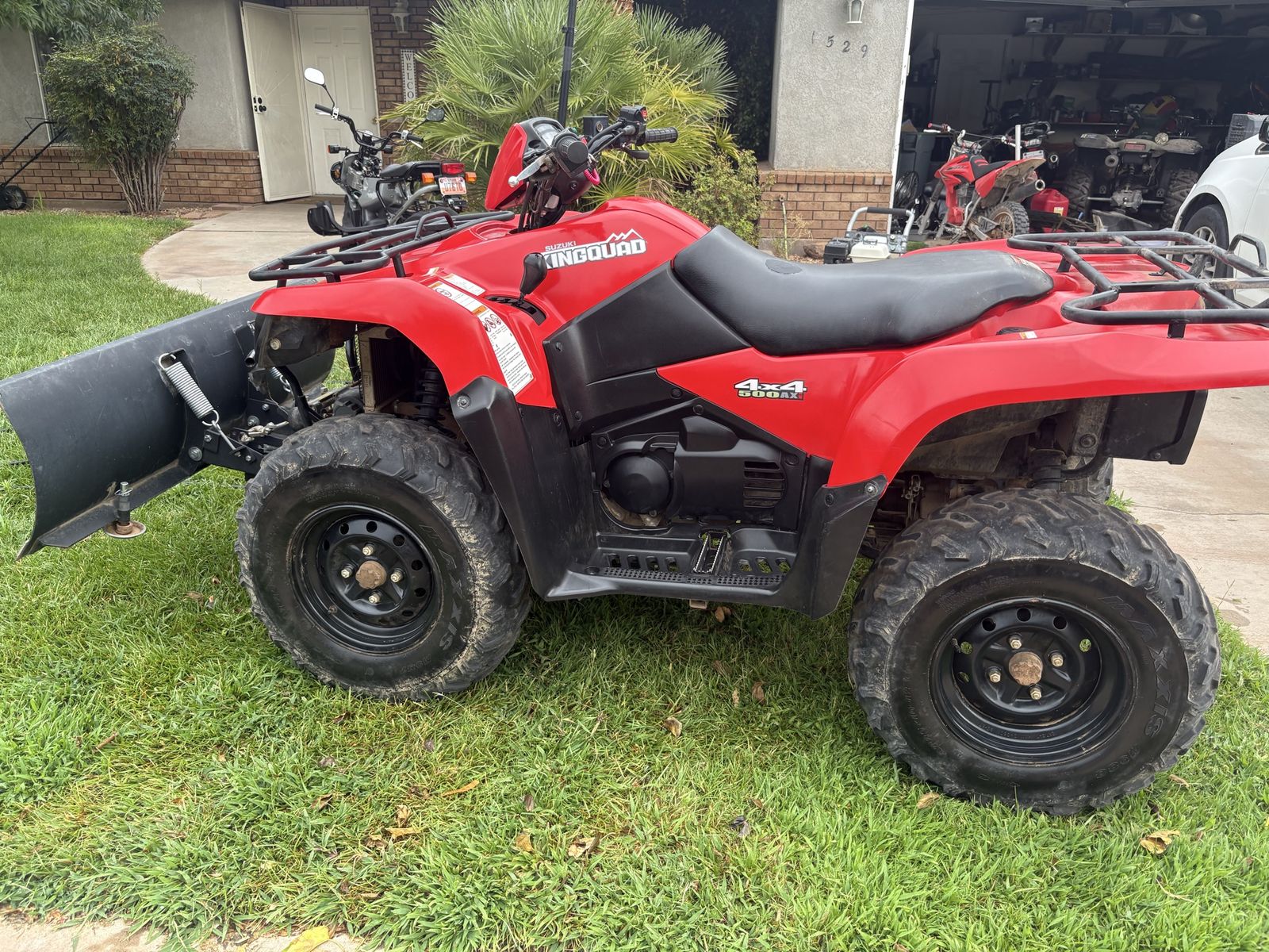 2013 Suzuki King Quad 500 axi 4x4 w/ plow