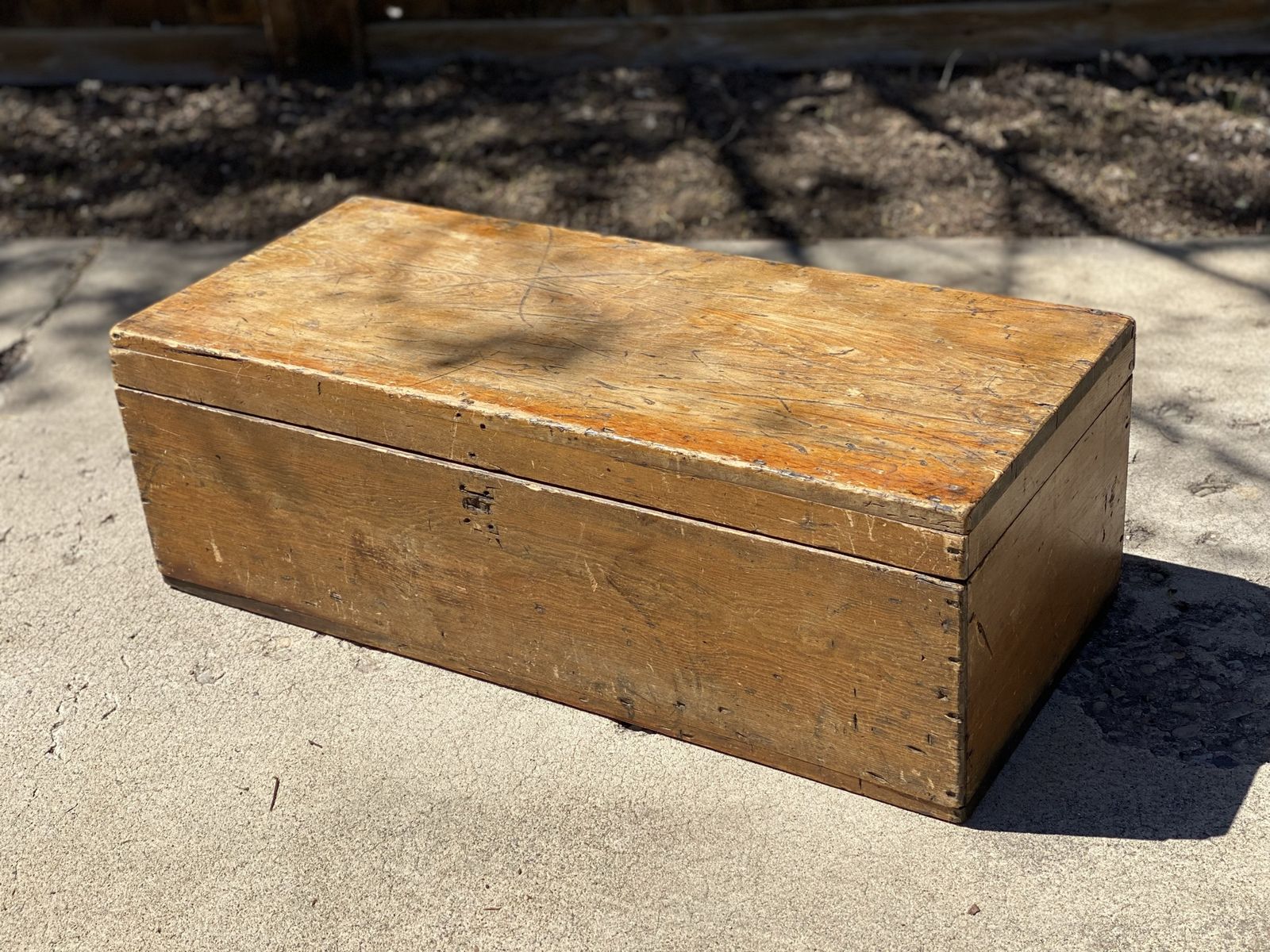 Antique wooden foot locker