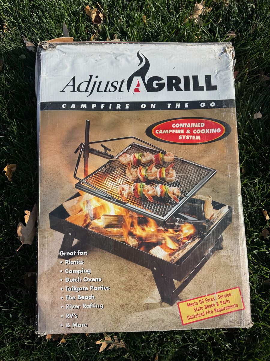 NEW Adjust-A-Grill Campfire Cooking System – Never Used