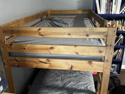 Twin bunk bed with ladder