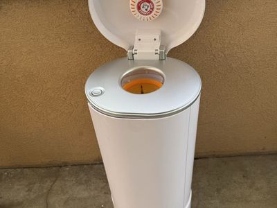 Munchkin® STEP™ Baby Diaper Pail, with Arm & Hammer™, #1 Odor Control, Hands-Free, Black