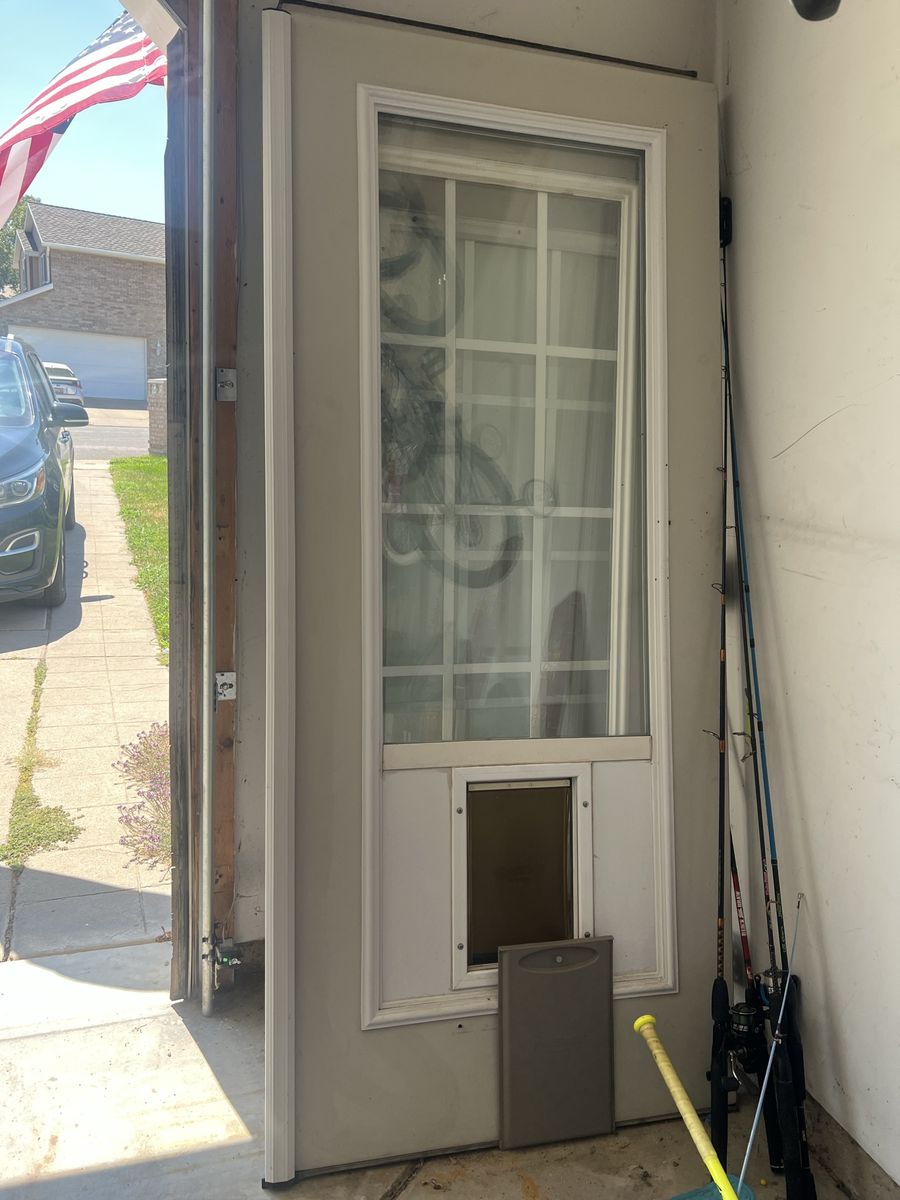 White Exterior Glass Door with Built-In Pet Door (79.5" x 33.5")