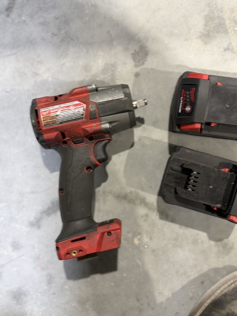 3/8 Milwakee Impact And 2 5.0ah Batterys