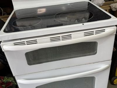 This is a GE Double Oven Range., $100 OBO top oven just used for warming.