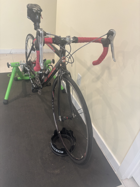 Motobecane Le Champion road bike and Kinetic Fluid Indoor Cycling Trainer