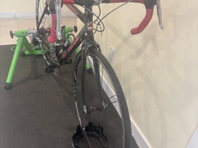 Motobecane Le Champion road bike and Kinetic Fluid Indoor Cycling Trainer