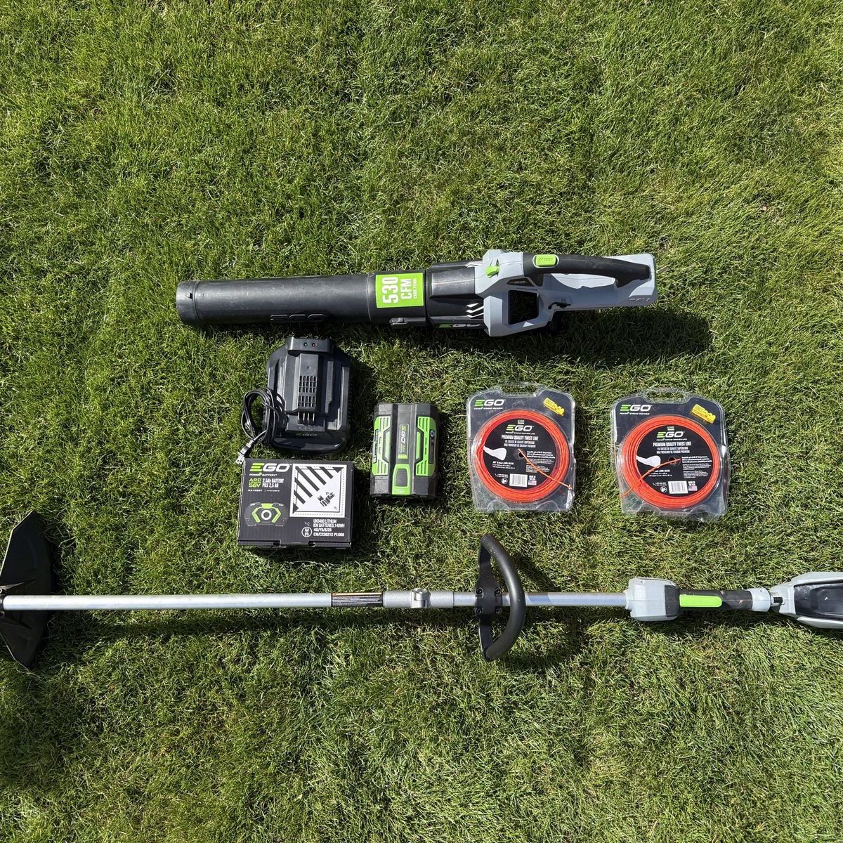 Ego Power+ Trimmer and Blower with 2 batteries.