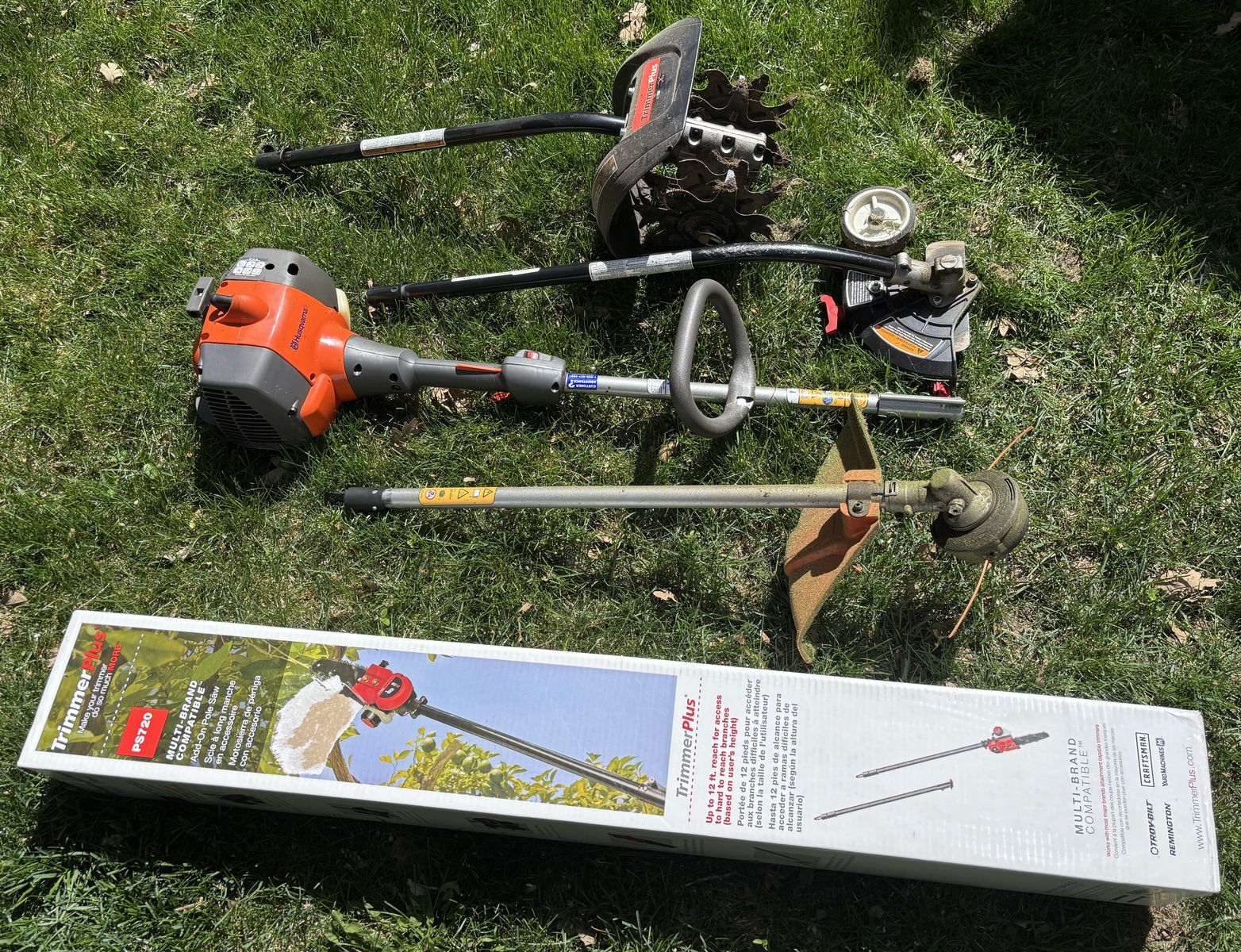 Husqvarna weed trimmer with attachments.