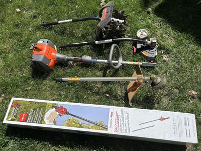 Husqvarna weed trimmer with attachments.