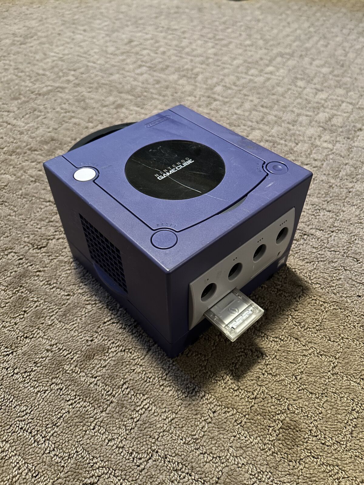 Nintendo GameCube (used, moderate condition) with a Need for Speed underground cd