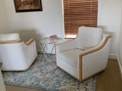 White chenille chairs swivel and rocking