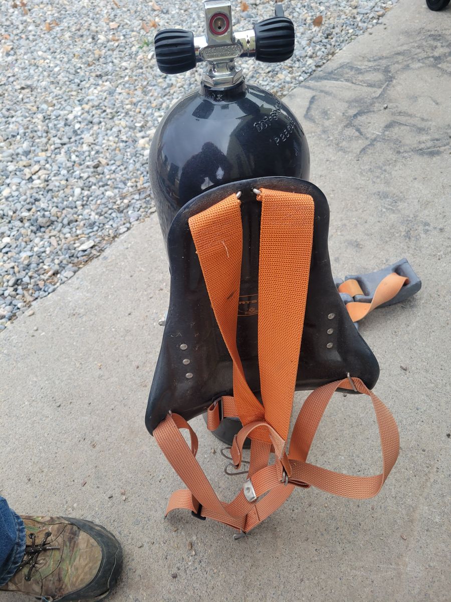 Scuba tank and weight belt