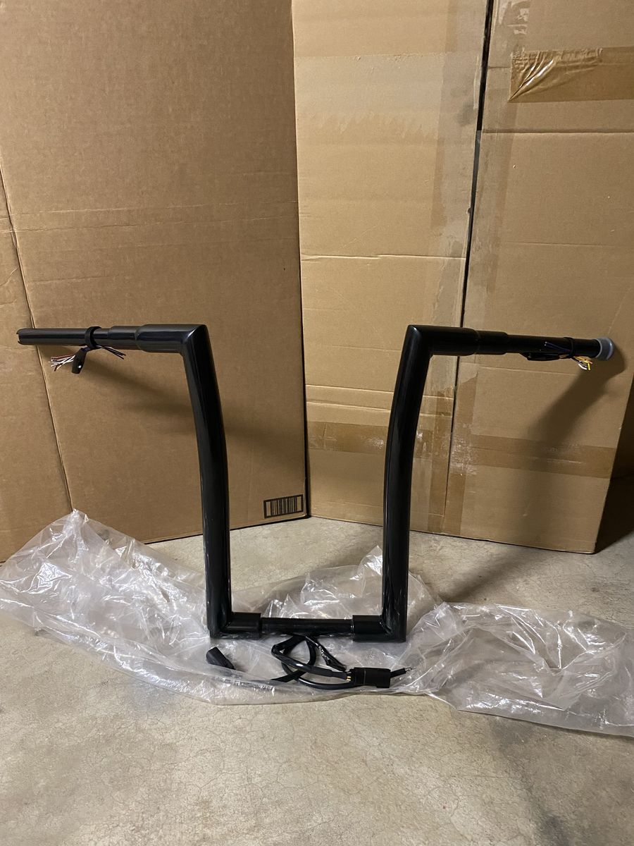 Pre-wired 16 inch ape hanger handle bars for a Harley Davidson