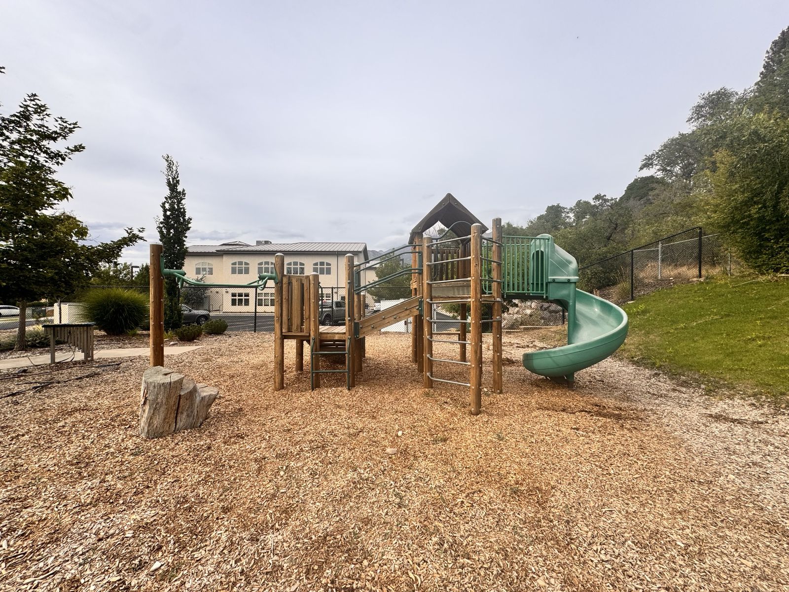 Large Commercial Wooden Play Structure with Spiral Slide and Monkey Bars