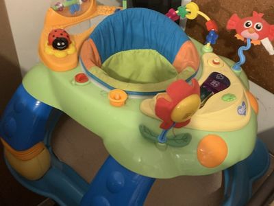 Sit in baby walker/rocker