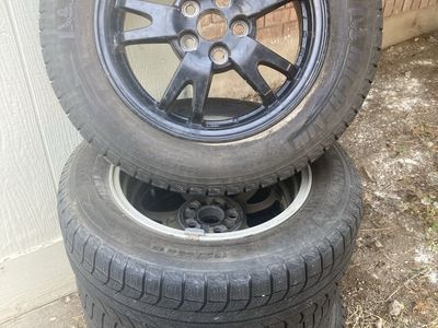 Michelin X-Ice 195/55R15 Winter Tires on Black Rims (Set of 4)