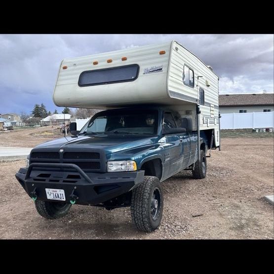 Northland Truck Camper with Renovated Interior, Kitchen, and Sleeping Area