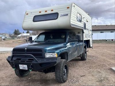 Northland Truck Camper with Renovated Interior, Kitchen, and Sleeping Area