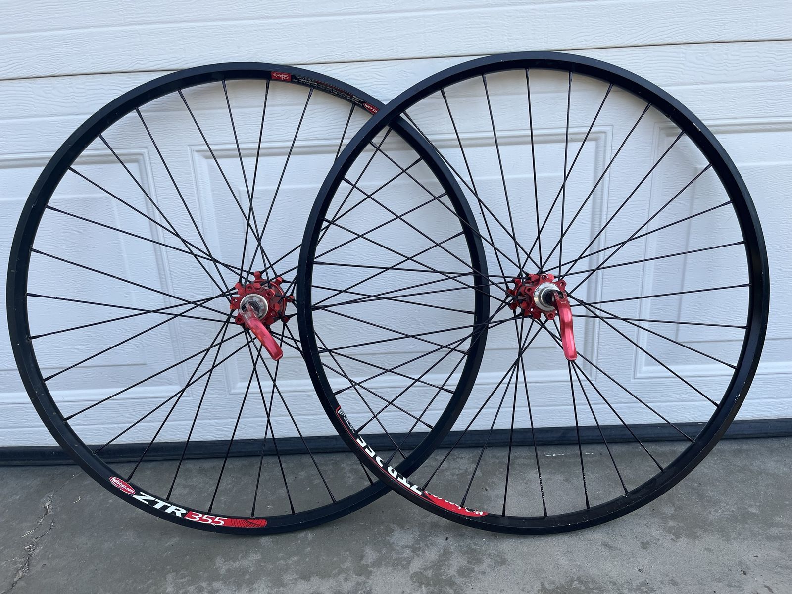 Industries Nine 26 Inch Disc Wheelset with Red Hubs Laced to ZTR 355 Rims with Skewers