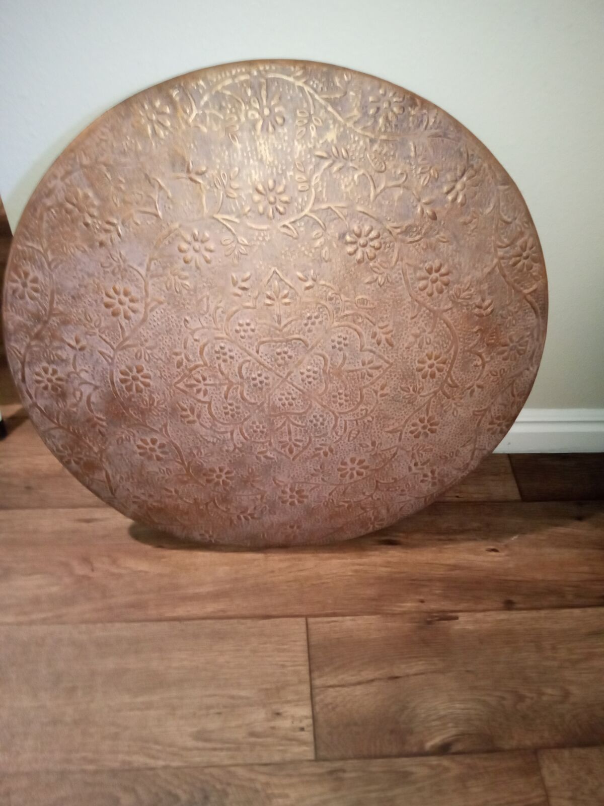 Round copper floral wall decor