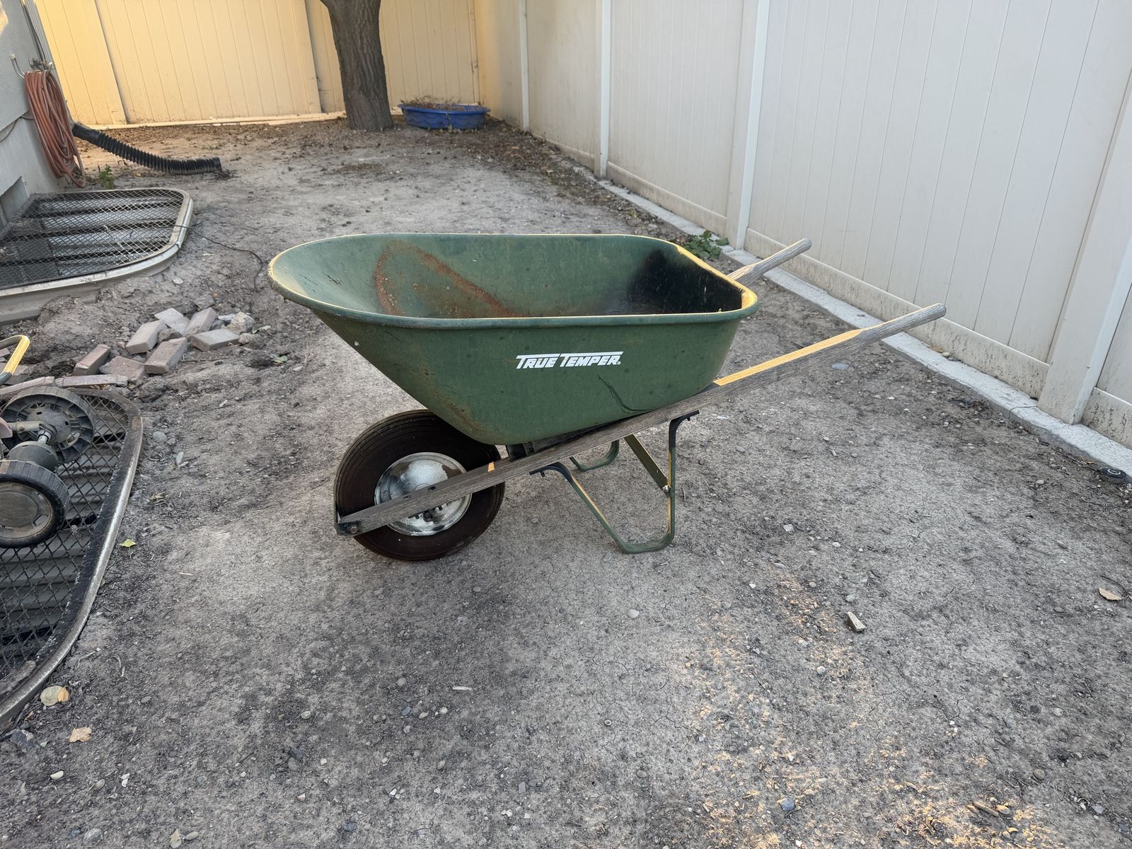 True Temper Green Wheelbarrow with Wooden Handles