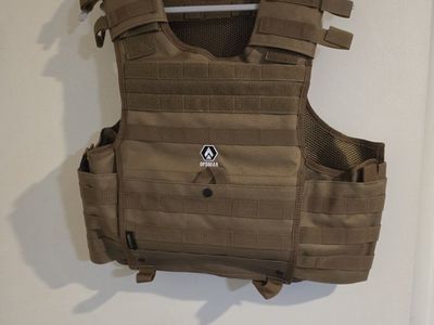 Plate carrier. Color is tan