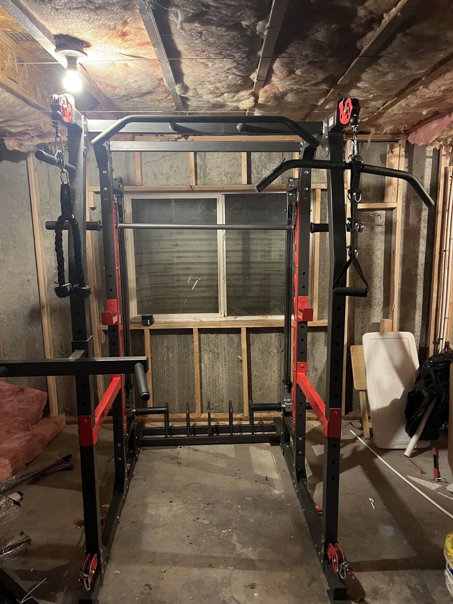Smith machine with cable pullies and accessories
