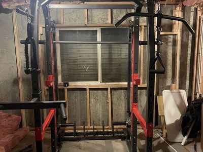 Smith machine with cable pullies and accessories