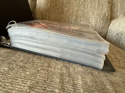 Binder with over 100 8x10 signed photos