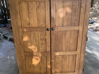 Beautiful Wooden Armoire with Doors and Shelves
