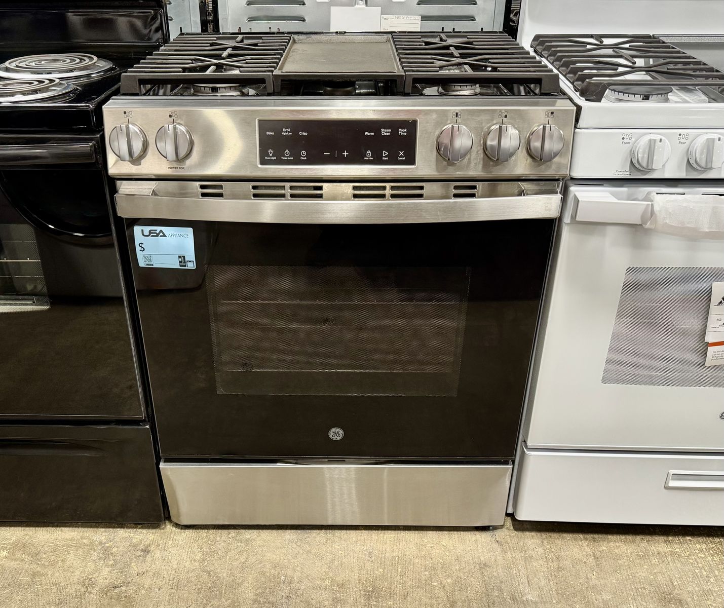 GE SLIDE IN GAS RANGE WITH WARRANTY
