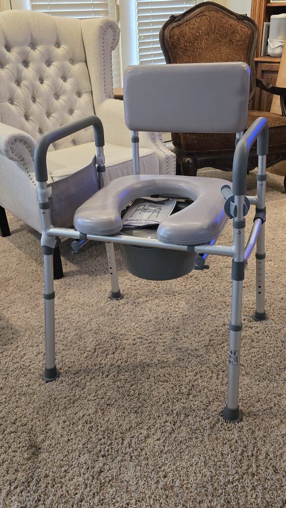 Unused. Bedside commode