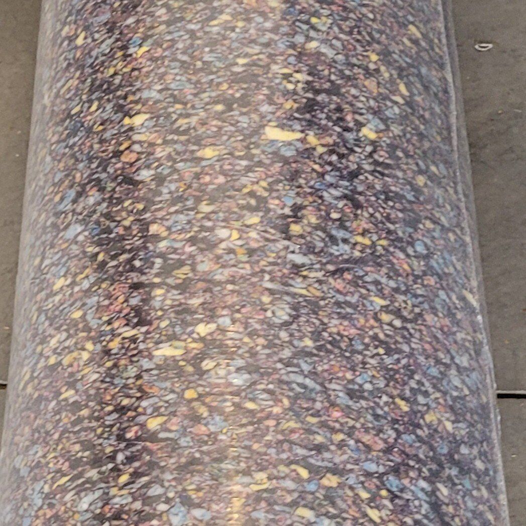 new 8 lb pad with moisture barrier