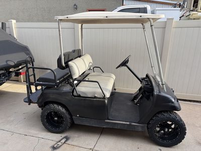 Black Golf Cart gas powered with Roof and Convertible Rear Cargo Bed