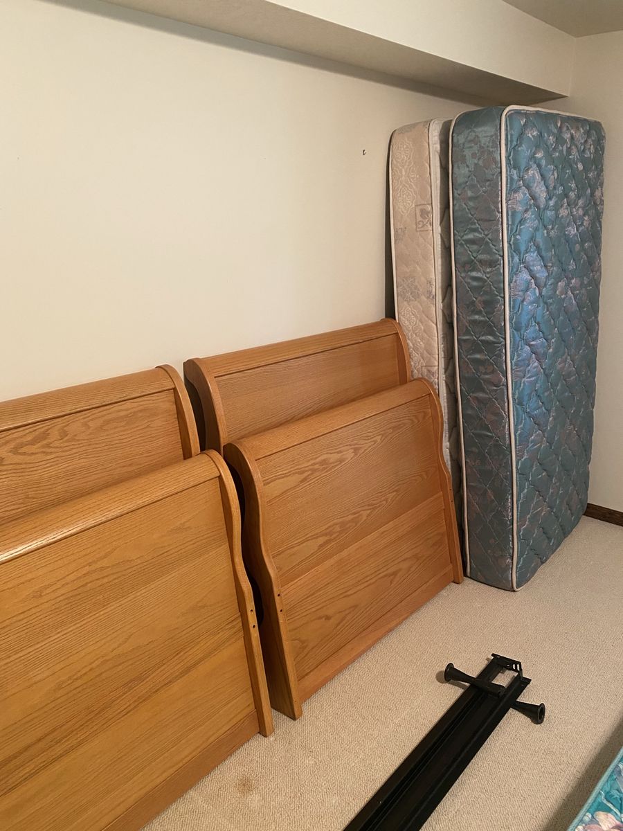 Twin sleigh beds (2) with mattresses $50