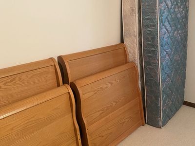 Twin sleigh beds (2) with mattresses $50